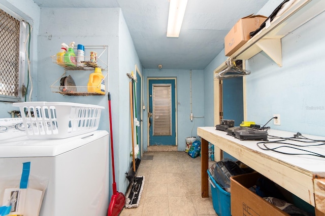 clothes washing area featuring washer / clothes dryer