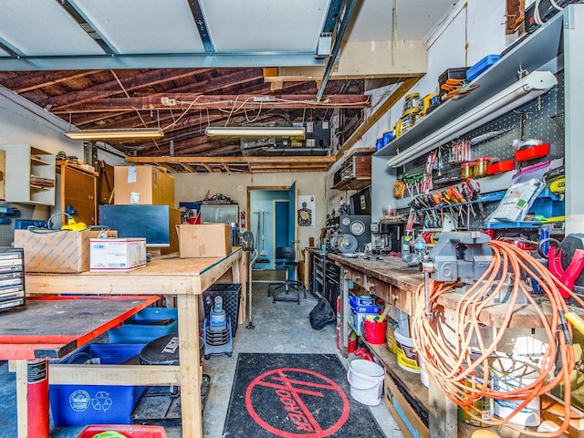 garage featuring a workshop area