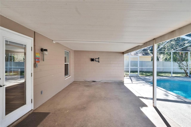 view of patio with a fenced in pool