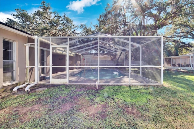 view of yard featuring a lanai