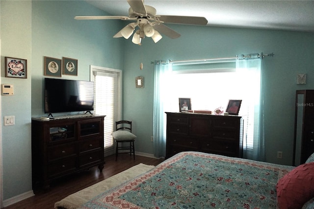 bedroom with ceiling fan, dark hardwood / wood-style flooring, and lofted ceiling