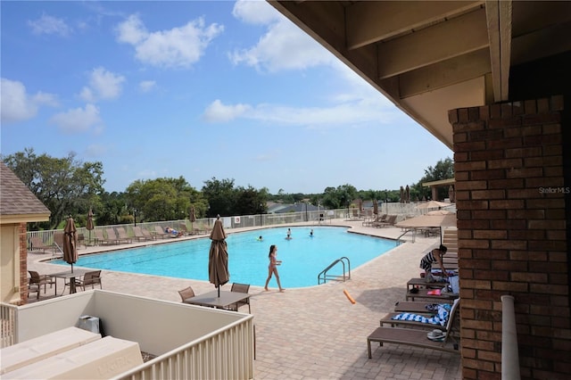 view of pool with a patio area