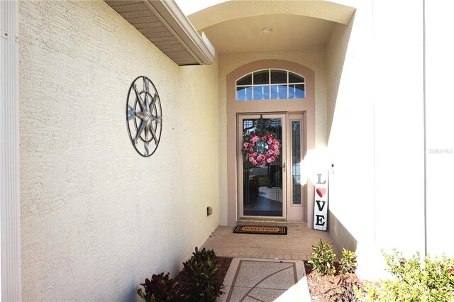 11021 Edge Park Dr, Hudson, FL 34667 - property entrance with stucco siding