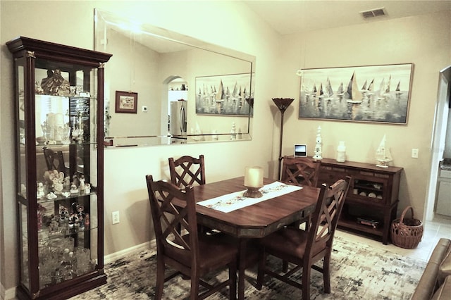 11021 Edge Park Dr, Hudson, FL 34667 - dining space featuring arched walkways