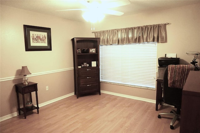 11021 Edge Park Dr, Hudson, FL 34667 - home office featuring light wood finished floors and a ceiling fan