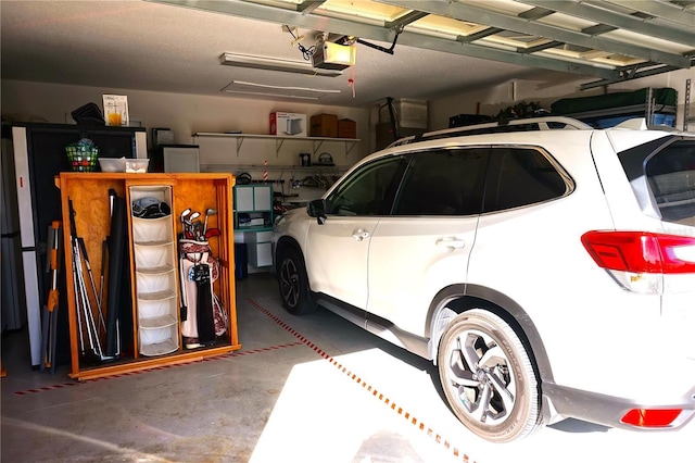 11021 Edge Park Dr, Hudson, FL 34667 - garage featuring a garage door opener