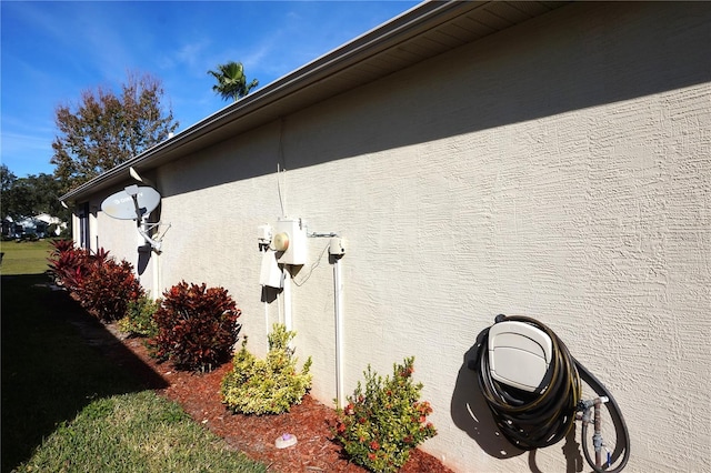 11021 Edge Park Dr, Hudson, FL 34667 - view of home's exterior featuring stucco siding