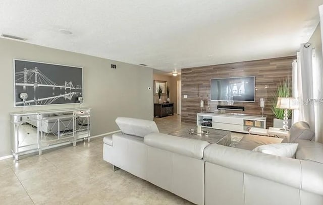 living room with wood walls