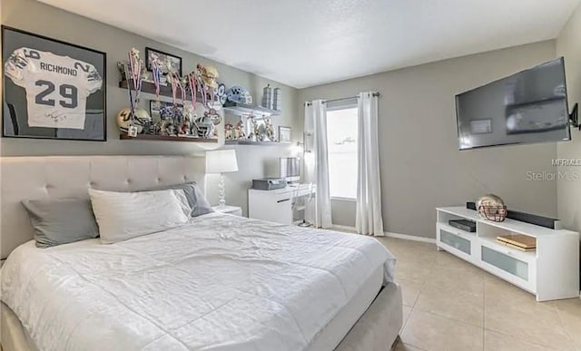 bedroom with light tile patterned flooring