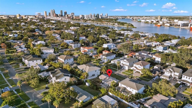 birds eye view of property featuring a water view