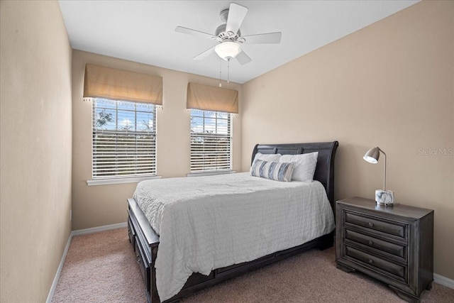 bedroom with ceiling fan and carpet flooring