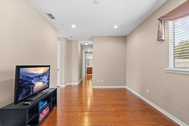 20314 Chestnut Grove Dr, Tampa, FL 33647 - unfurnished living room with recessed lighting, baseboards, visible vents, and wood finished floors