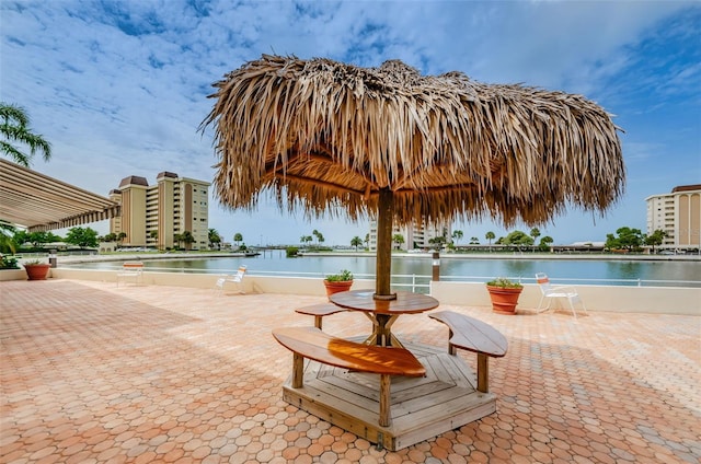 view of swimming pool featuring a water view