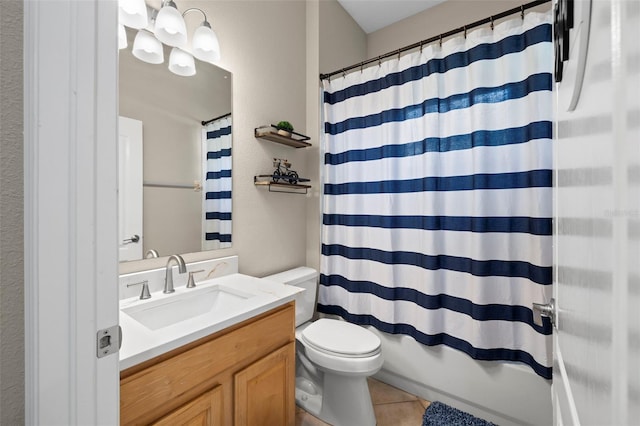 full bathroom with shower / bath combo with shower curtain, tile patterned flooring, vanity, and toilet