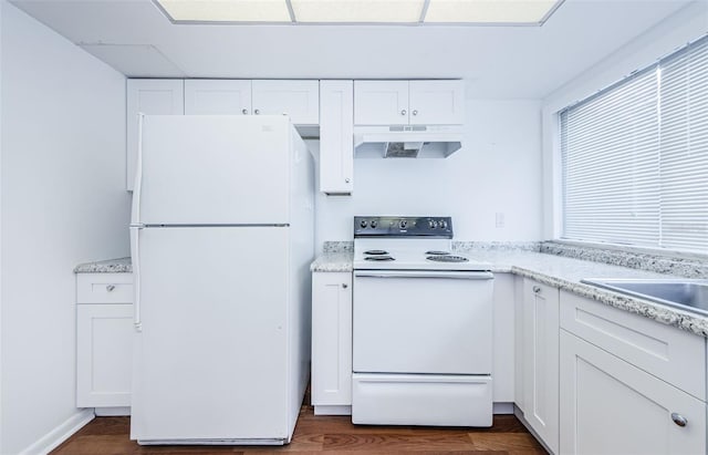 kitchen with white cabinetry, dark wood-type flooring, light stone counters, white refrigerator, and range with electric stovetop