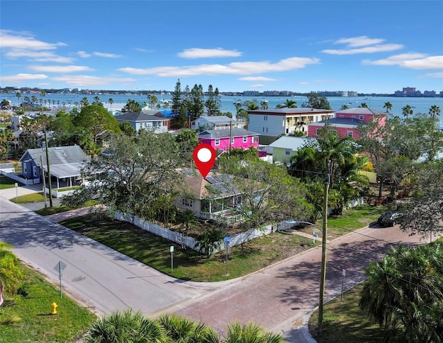 birds eye view of property featuring a water view