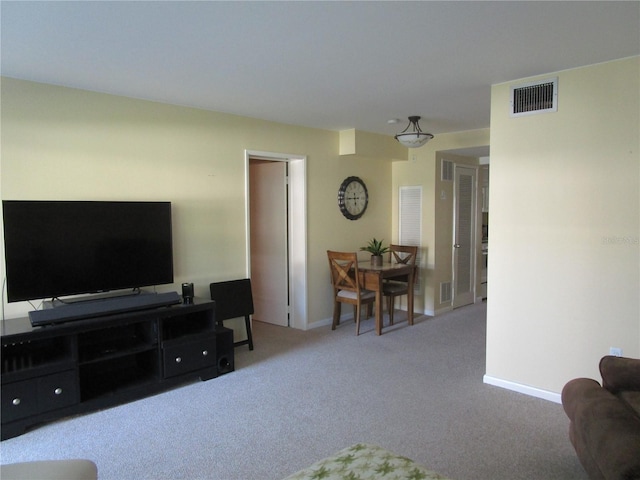 living room with light carpet