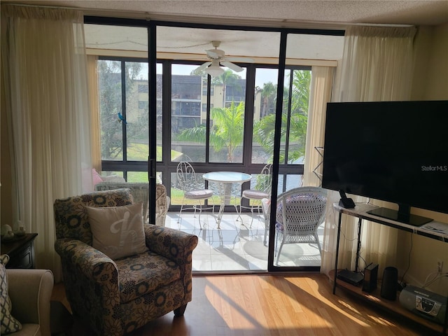 entryway featuring hardwood / wood-style floors and ceiling fan