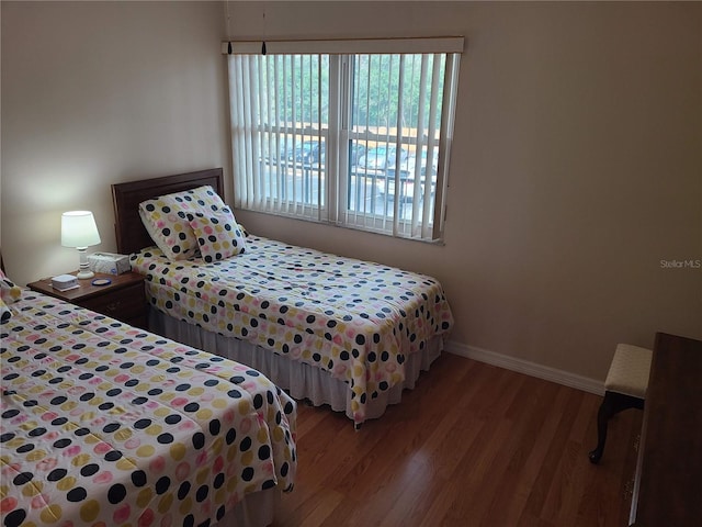 bedroom with light hardwood / wood-style floors