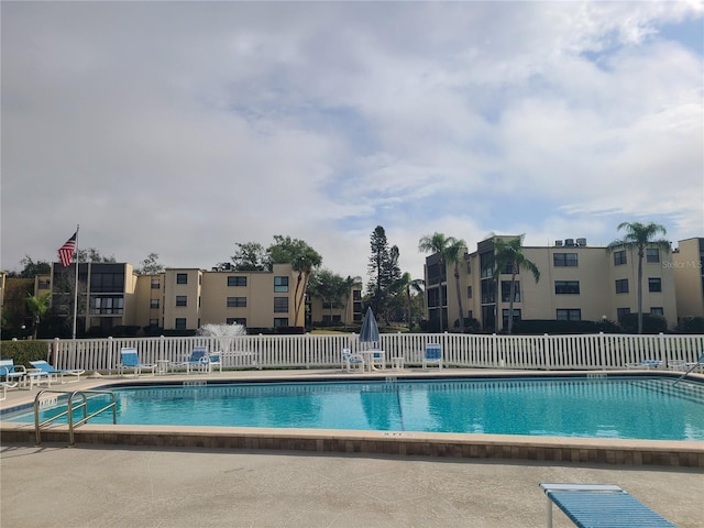 view of swimming pool featuring a patio area