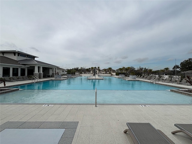 view of pool featuring a patio