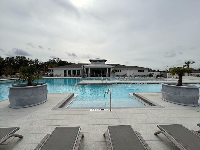 view of swimming pool with a patio area and a gazebo