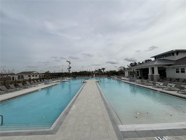 view of swimming pool featuring a patio area