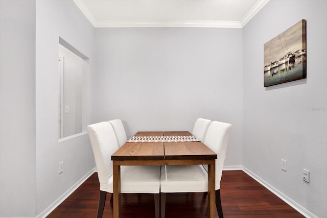 dining space with crown molding and dark wood-type flooring