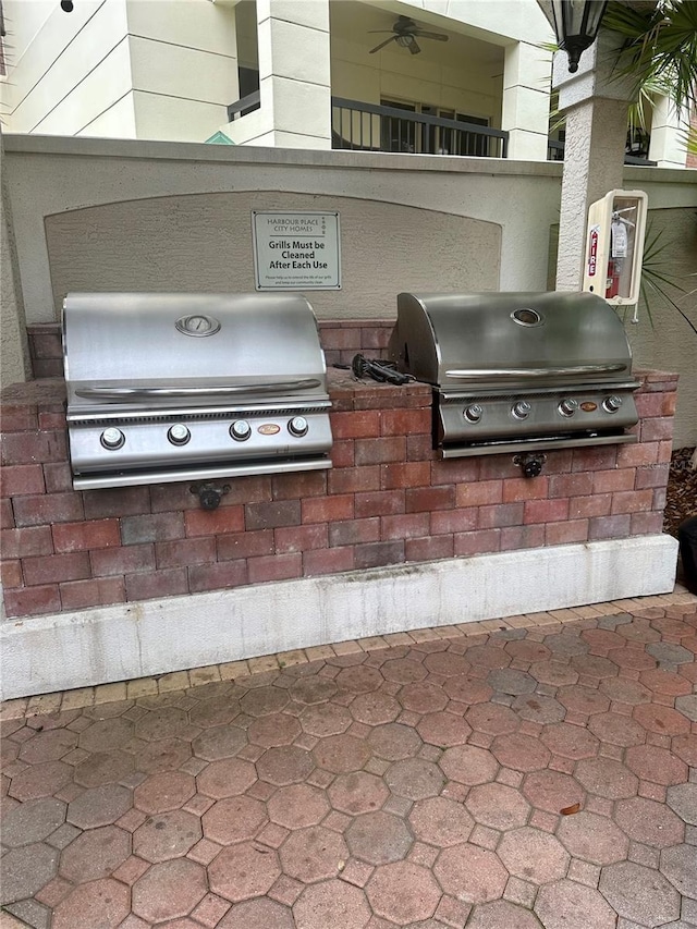 view of patio with area for grilling and grilling area