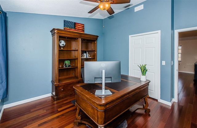 office space with ceiling fan, lofted ceiling, and dark hardwood / wood-style flooring