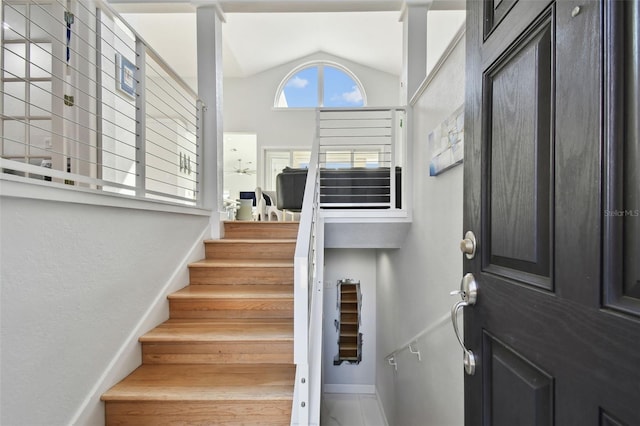 entryway featuring vaulted ceiling