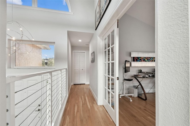 hall featuring wood-type flooring