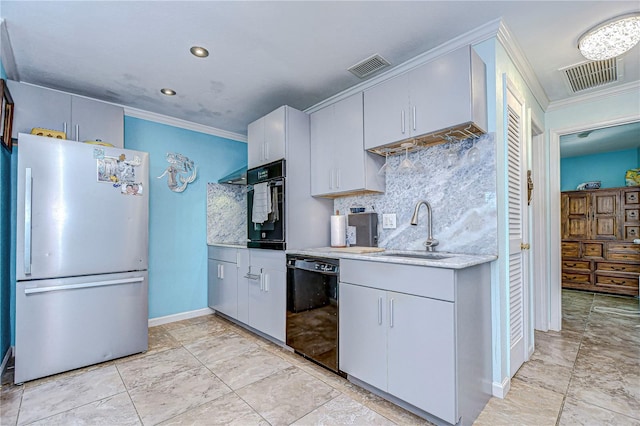 kitchen with crown molding, decorative backsplash, sink, and black appliances