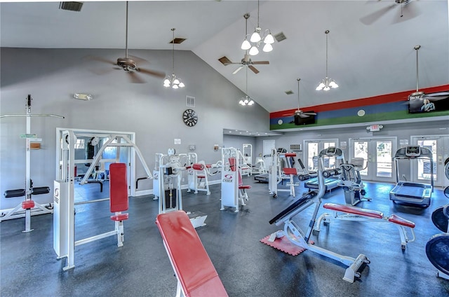 workout area featuring ceiling fan with notable chandelier, high vaulted ceiling, and french doors