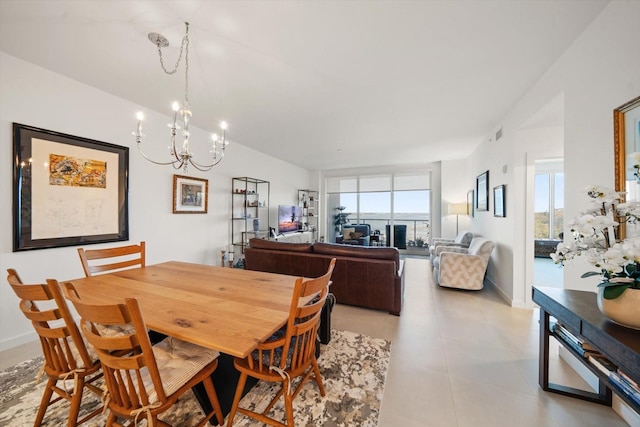 dining area with a notable chandelier