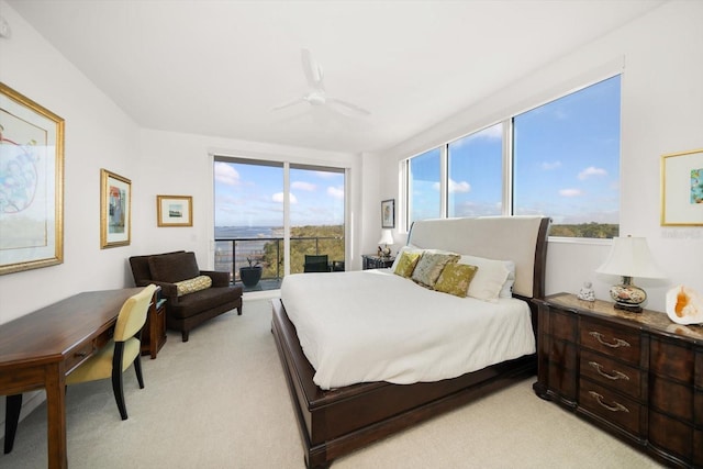 bedroom featuring ceiling fan and light colored carpet