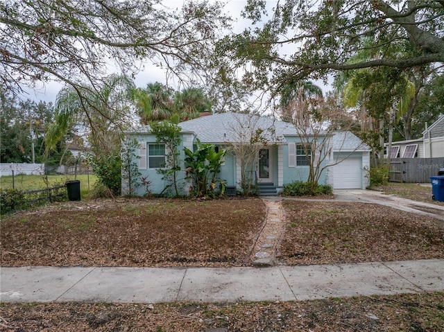 single story home featuring a garage