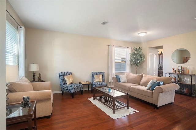 living room featuring dark hardwood / wood-style floors