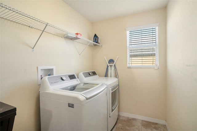 laundry area featuring washer and clothes dryer