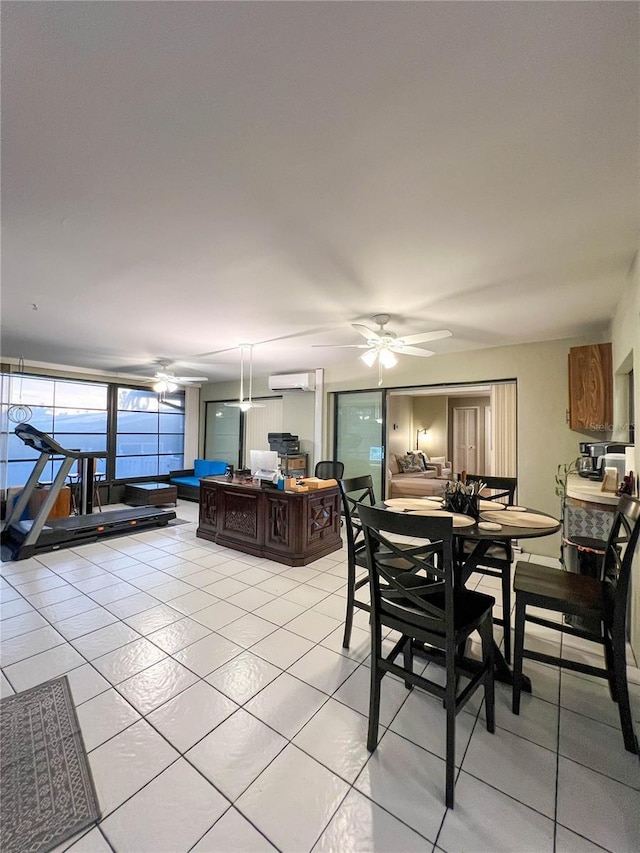 dining room with ceiling fan, a wall mounted AC, and light tile patterned flooring