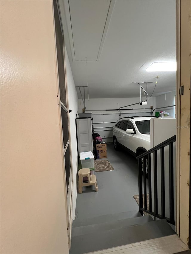 garage featuring a garage door opener