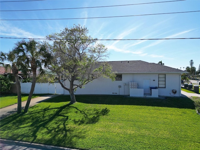 exterior space with a front lawn