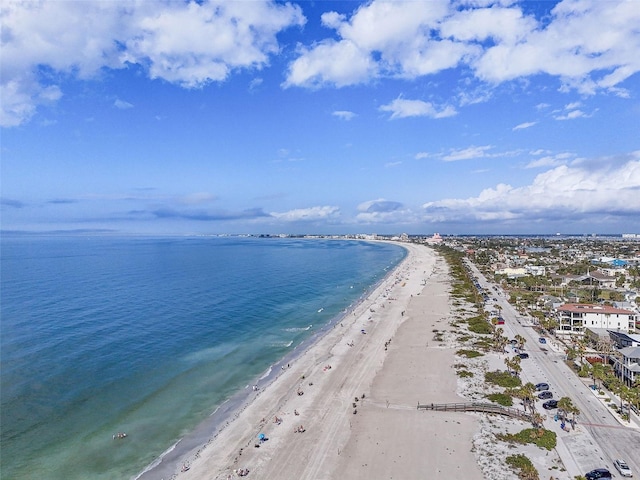 aerial view featuring a view of the beach and a water view