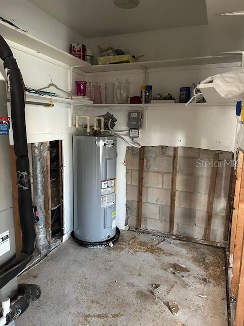 utility room with water heater