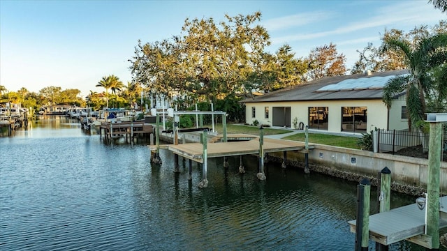 view of dock with a water view