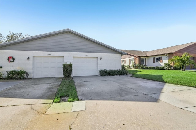 ranch-style home with a front lawn