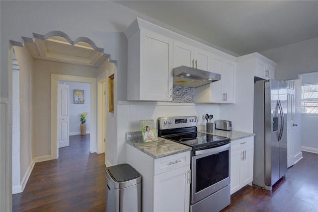 kitchen featuring light stone countertops, white cabinets, and appliances with stainless steel finishes