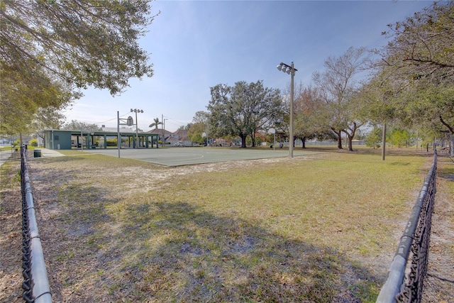 view of yard featuring basketball court