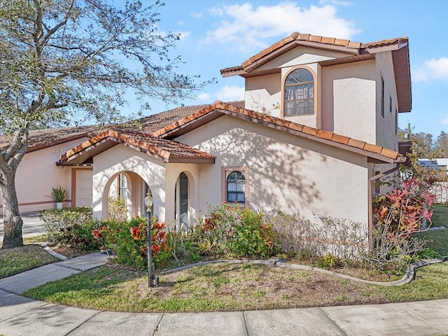 view of mediterranean / spanish house