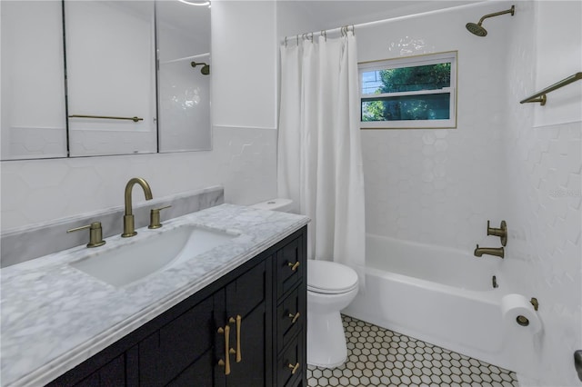 full bathroom with vanity, toilet, and shower / bathtub combination with curtain